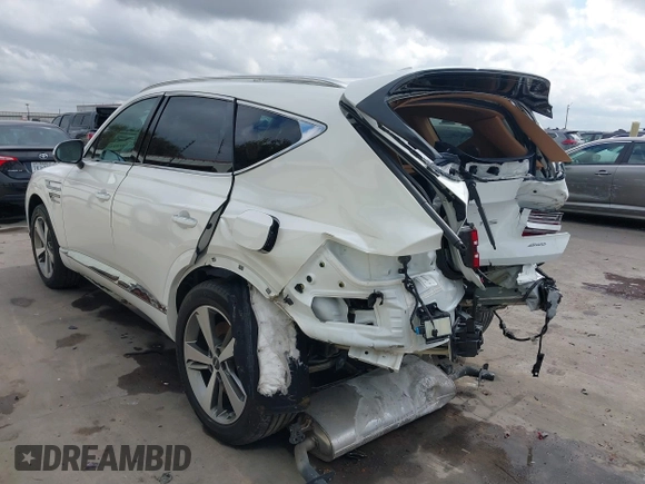 2023 Genesis GV80 with VIN KMUHBDSB2PU105268, listed as a IAAI auction lot 40791181 with 21,569 mi miles and . Bid and sale history available at DreamBid. Image 3.