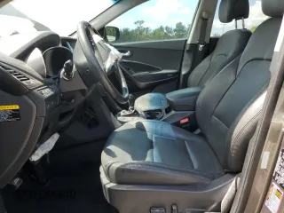 2017 Hyundai Santa Fe Ultimate z VIN 5XYZW4LA8HG491652, wystawiony jako Copart lot #56907985 z przebiegiem Nie podano mil oraz Szkoda całkowita • Salvage title. Historia ofert i sprzedaży dostępna na DreamBid. Obrazek 7.