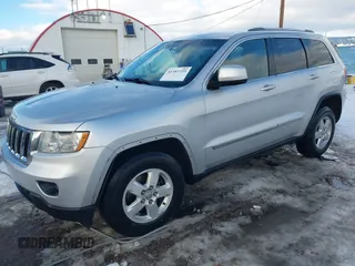 2011 Jeep Grand Cherokee Laredo with VIN 1J4RR4GG7BC584500, listed as a IAAI auction lot 41383355 with 161,722 mi miles. Bid and sale history available at carsss.com. Image 17.