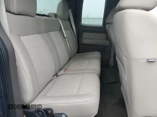 2010 Ford F-150 XL with VIN 1FTEX1C82AFA13498, listed as a Copart auction lot 59487255 with 125,410 mi miles and Salvage title. Bid and sale history available at DreamBid. Image 10.