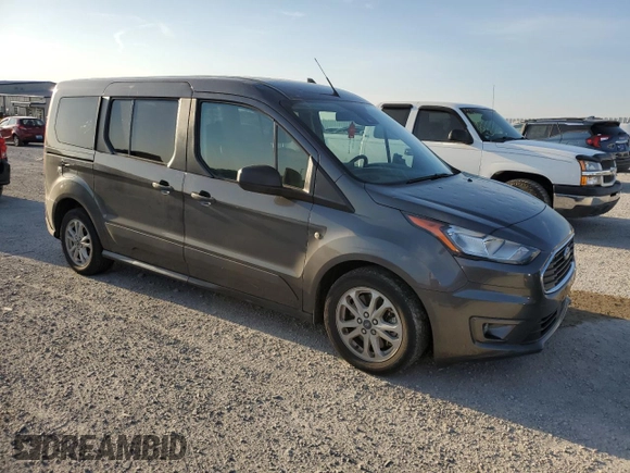 2021 Ford Transit Connect XLT with VIN NM0GS9F21M1487521, listed as a Copart auction lot 53732695 with 58,187 mi miles and Salvage title. Bid and sale history available at DreamBid. Image 4.