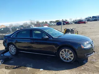 2015 Audi A8 L 4.0T with VIN WAU32AFD1FN021343, listed as a IAAI auction lot 41634469 with 88,229 mi miles. Bid and sale history available at carsss.com. Image 14.