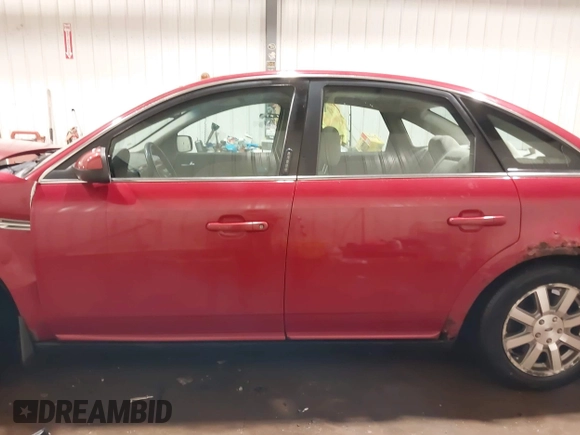 2009 Ford Taurus SEL with VIN 1FAHP24W89G123452, listed as a IAAI auction lot 41335622 with 229,182 mi miles. Bid and sale history available at carsss.com. Image 14.
