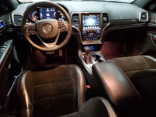 2017 Jeep Grand Cherokee Trailhawk with VIN 1C4RJFLG8HC618709, listed as a Copart auction lot 52899194 with 69,000 mi miles and Salvage title. Bid and sale history available at DreamBid. Image 8.
