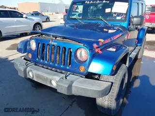 2010 Jeep Wrangler Unlimited Sport with VIN 1J4BA3H18AL105500, listed as a IAAI auction lot 41634465 with 230,453 mi miles. Bid and sale history available at carsss.com. Image 6.