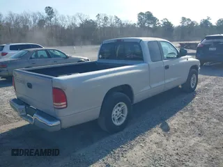 2000 Dodge Dakota with VIN 1B7GL22XXYS577744, listed as a IAAI auction lot 41509241 with 163,054 mi miles. Bid and sale history available at carsss.com. Image 4.
