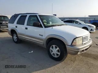 2000 Oldsmobile Bravada z VIN 1GHDT13W9Y2384823, wystawiony jako Copart lot #83105794 z przebiegiem Nie podano mil oraz Tytuł czysty. Historia ofert i sprzedaży dostępna na DreamBid. Obrazek 4.