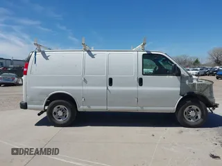2018 Chevrolet Express Cargo Van with VIN 1GCWGAFP6J1332570, listed as a IAAI auction lot 41482103 with 142,405 mi miles. Bid and sale history available at carsss.com. Image 13.