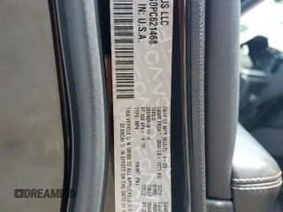 2023 Jeep Grand Cherokee Limited z VIN 1C4RJHBG0PC621468, wystawiony jako Copart lot #64224565 z przebiegiem 33 022 mil mil oraz Szkoda całkowita • Salvage title. Historia ofert i sprzedaży dostępna na DreamBid. Obrazek 13.