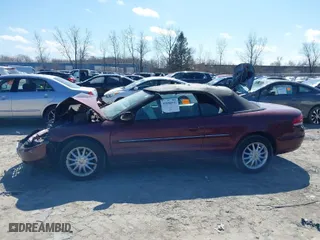 2002 Chrysler Sebring Conv with VIN 1C3EL45R12N279240, listed as a IAAI auction lot 41886541 with 65,576 mi miles. Bid and sale history available at carsss.com. Image 14.