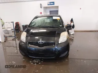 2011 Toyota Yaris with VIN JTDJT4K3XB5327229, listed as a IAAI auction lot 41275717 with 140,276 mi miles. Bid and sale history available at carsss.com. Image 12.