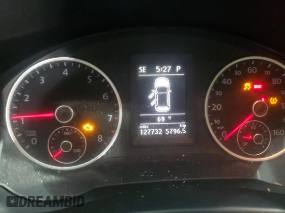 2012 Volkswagen Tiguan SE z VIN WVGAV7AX5CW536238, wystawiony jako Copart lot #55528005 z przebiegiem 127 732 mil mil oraz Szkody całkowita. Historia ofert i sprzedaży dostępna na DreamBid. Obrazek 9.