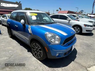 2012 MINI Countryman S with VIN WMWZC5C50CWL59575, listed as a Copart auction lot 64141535 with 118,911 mi miles and Clean title. Bid and sale history available at DreamBid. Image 1.