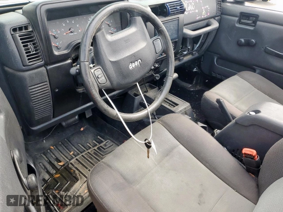2005 Jeep Wrangler X with VIN 1J4FA39S25P367360, listed as a Copart auction lot 57504365 with 112,125 mi miles and Salvage title. Bid and sale history available at DreamBid. Image 8.
