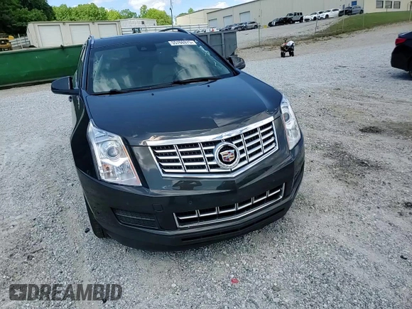 2015 Cadillac SRX Luxury Collection z VIN 3GYFNBE31FS598363, wystawiony jako Copart lot #55766975 z przebiegiem 62 103 mil mil oraz Szkody całkowita. Historia ofert i sprzedaży dostępna na DreamBid. Obrazek 14.