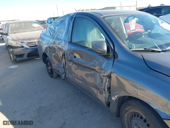 2019 Nissan Versa Sedan SV with VIN 3N1CN7AP8KL812271, listed as a IAAI auction lot 41423740 with 57,233 mi miles. Bid and sale history available at carsss.com. Image 6.