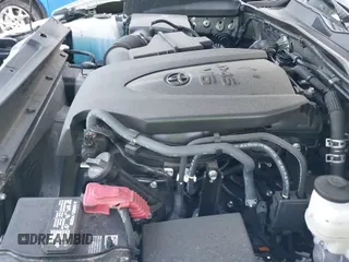 2022 Toyota Tacoma SR with VIN 3TMCZ5AN1NM519301, listed as a IAAI auction lot 42611422 with 35,889 mi miles and . Bid and sale history available at DreamBid. Image 19.