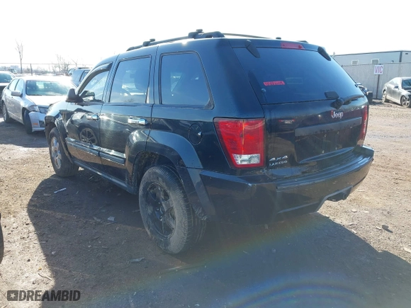 2008 Jeep Grand Cherokee Laredo with VIN 1J8GR48K98C193110, listed as a IAAI auction lot 41833331 with 174,518 mi miles. Bid and sale history available at carsss.com. Image 3.