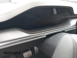 2022 Tesla Model X Plaid z VIN 7SAXCBE67NF339557, wystawiony jako IAAI lot #41825360 z przebiegiem 70 mil mil oraz . Historia ofert i sprzedaży dostępna na DreamBid. Obrazek 15.