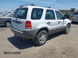 2001 Ford Escape XLS with VIN 1FMYU021X1KA59670, listed as a IAAI auction lot 42551801 with 189,058 mi miles and . Bid and sale history available at DreamBid. Image 4.