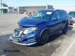 2017 Nissan Rogue SV with VIN KNMAT2MV9HP553763, listed as a IAAI auction lot 42380808 with 100,372 mi miles and . Bid and sale history available at DreamBid. Image 2.