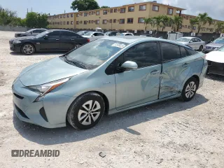 2017 Toyota Prius Two z VIN JTDKARFUXH3040343, wystawiony jako Copart lot #57870425 z przebiegiem 59 711 mil mil oraz Szkoda całkowita • Salvage title. Historia ofert i sprzedaży dostępna na DreamBid. Obrazek 1.