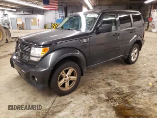 2011 Dodge Nitro SXT z VIN 1D4PT5GK1BW544942, wystawiony jako Copart lot #79857243 z przebiegiem 128 613 mil mil oraz Tytuł czysty. Historia ofert i sprzedaży dostępna na DreamBid. Obrazek 1.