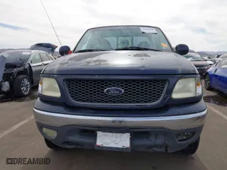 2000 Ford F-150 XL with VIN 1FTRX18L2YKA10388, listed as a IAAI auction lot 41526430 with 144,480 mi miles. Bid and sale history available at carsss.com. Image 6.