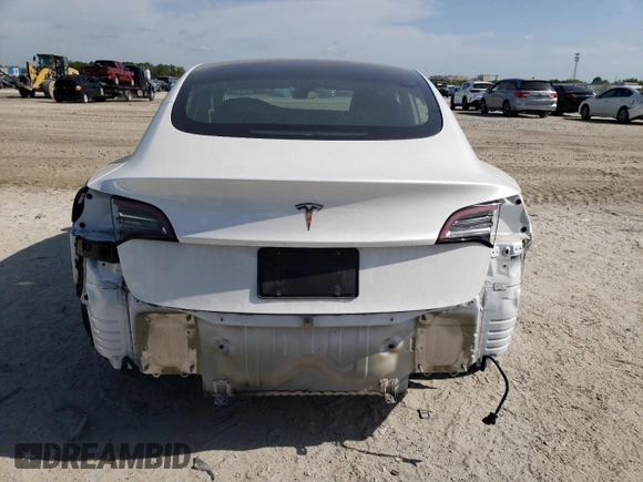 2022 Tesla Model 3 with VIN 5YJ3E1EA0NF320658, listed as a Copart auction lot 53317305 with 27,839 mi miles and Non Repairable. Bid and sale history available at carsss.com. Image 6.