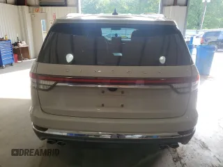 2021 Lincoln Aviator Reserve with VIN 5LM5J7XC9MGL13856, listed as a Copart auction lot 53813935 with 56,816 mi miles and Salvage title. Bid and sale history available at DreamBid. Image 6.