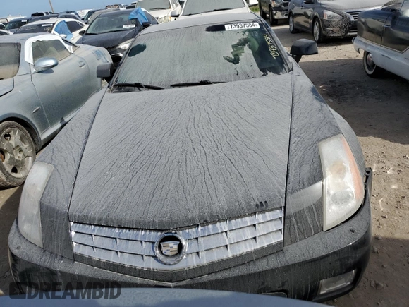 2006 Cadillac XLR z VIN 1G6YV36A965600309, wystawiony jako Copart lot #73937584 z przebiegiem Nie podano mil oraz Szkoda całkowita • Salvage title. Historia ofert i sprzedaży dostępna na DreamBid. Obrazek 5.