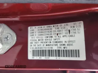 2007 Honda CR-V EX z VIN JHLRE48577C115190, wystawiony jako Copart lot #53149675 z przebiegiem 143 170 mil mil oraz Szkoda całkowita • Salvage title. Historia ofert i sprzedaży dostępna na DreamBid. Obrazek 13.