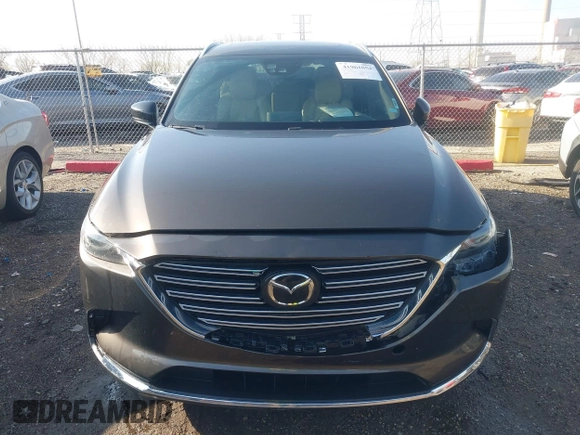 2016 Mazda CX-9 Grand Touring z VIN JM3TCBDY3G0104001, wystawiony jako IAAI lot #41961054 z przebiegiem 77 057 mil mil oraz . Historia ofert i sprzedaży dostępna na DreamBid. Obrazek 12.