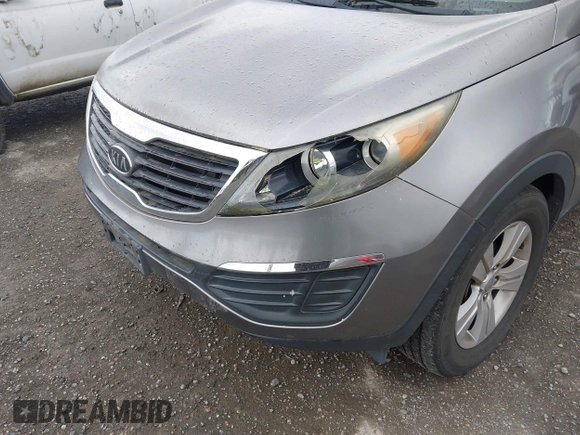 2012 Kia Sportage LX with VIN KNDPB3A22C7262656, listed as a IAAI auction lot 42301331 with 180,743 mi miles and . Bid and sale history available at DreamBid. Image 6.