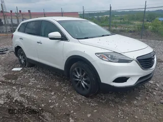 2014 Mazda CX-9 Grand Touring z VIN JM3TB3DVXE0445309, wystawiony jako IAAI lot #42286922 z przebiegiem 219 442 mil mil oraz . Historia ofert i sprzedaży dostępna na DreamBid. Obrazek 1.