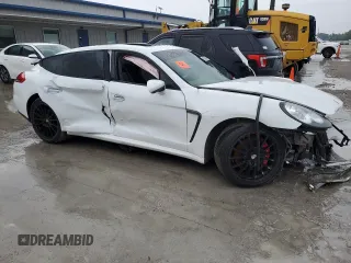 2016 Porsche Panamera 4 с VIN WP0AA2A76GL002305, выставлен на аукционе Copart как лот 57605185 с пробегом Не указан миль и Чистый • Clean title. История ставок и продаж доступна на DreamBid. Изображение 4.