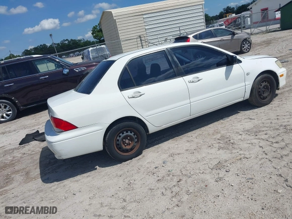 2002 Mitsubishi Lancer ES with VIN JA3AJ26E42U054430, listed as a IAAI auction lot 41918246 with 192,996 mi miles. Bid and sale history available at carsss.com. Image 4.