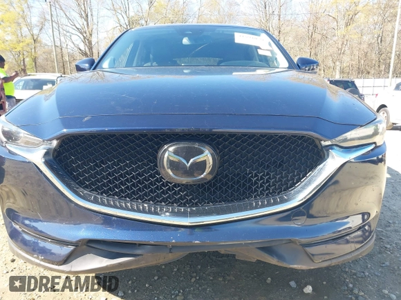 2018 Mazda CX-5 Grand Touring with VIN JM3KFADM1J0322049, listed as a IAAI auction lot 41891079 with 174,939 mi miles and . Bid and sale history available at DreamBid. Image 6.