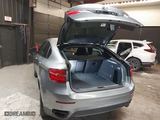 2014 BMW X6 50i with VIN 5UXFG8C55EL592995, listed as a IAAI auction lot 41724960 with 137,112 mi miles. Bid and sale history available at carsss.com. Image 3.