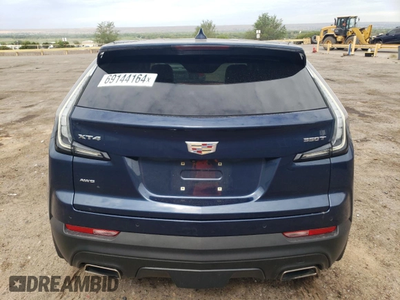 2021 Cadillac XT4 AWD Luxury with VIN 1GYFZBR41MF003522, listed as a Copart auction lot 69144164 with 17,953 mi miles and Salvage Title. Bid and sale history available at carsss.com. Image 6.