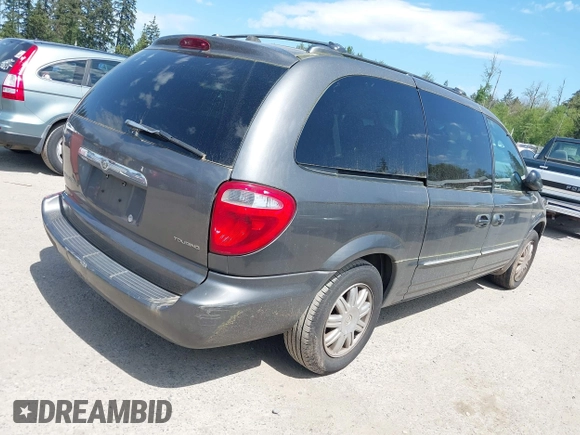 2004 Chrysler Town & Country Touring with VIN 2C4GP54L04R534395, listed as a IAAI auction lot 42182506 with 195,611 mi miles and . Bid and sale history available at DreamBid. Image 4.