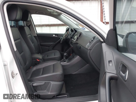 2015 Volkswagen Tiguan R-Line with VIN WVGAV7AX5FW585248, listed as a IAAI auction lot 41909618 with 137,448 mi miles and . Bid and sale history available at DreamBid. Image 5.