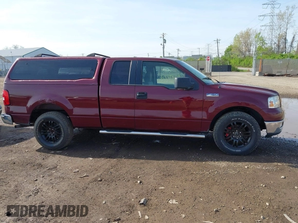 2005 Ford F-150 XLT with VIN 1FTPX12505FB69853, listed as a IAAI auction lot 42092756 with 330,699 mi miles. Bid and sale history available at carsss.com. Image 13.