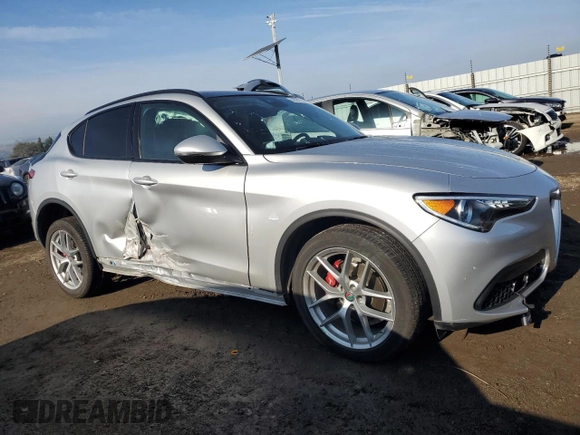 2019 Alfa Romeo Stelvio Ti z VIN ZASPAKBN2K7C40054, wystawiony jako Copart lot #86020774 z przebiegiem 16 135 mil mil oraz Szkody całkowita. Historia ofert i sprzedaży dostępna na DreamBid. Obrazek 4.