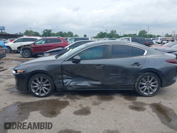 2021 Mazda 3 Preferred with VIN 3MZBPACL6MM252531, listed as a IAAI auction lot 42145811 with 35,869 mi miles and . Bid and sale history available at DreamBid. Image 13.