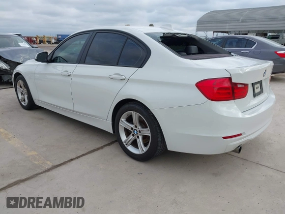 2015 BMW 3 Series 320i with VIN WBA3B1C50FK139723, listed as a IAAI auction lot 42035410 with 185,169 mi miles and . Bid and sale history available at DreamBid. Image 3.