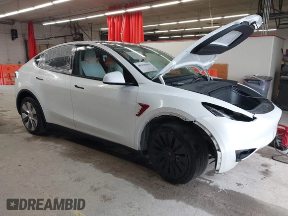 2023 Tesla Model Y Long Range with VIN 7SAYGDEE7PA100523, listed as a IAAI auction lot 40399455 with 18,885 mi miles and . Bid and sale history available at DreamBid. Image 1.