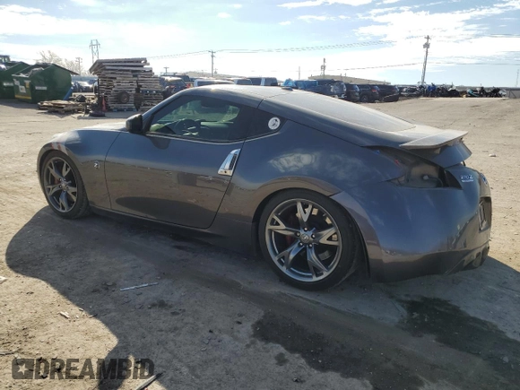 2010 Nissan 370Z Touring with VIN JN1AZ4EH6AM501763, listed as a Copart auction lot 45717785 with 102,341 mi miles and Salvage Title. Bid and sale history available at DreamBid. Image 2.