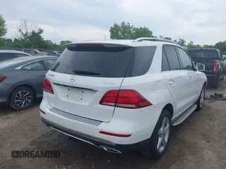 2018 Mercedes-Benz GLE 350 with VIN 4JGDA5HB0JB097977, listed as a IAAI auction lot 42496127 with 65,396 mi miles and . Bid and sale history available at DreamBid. Image 4.