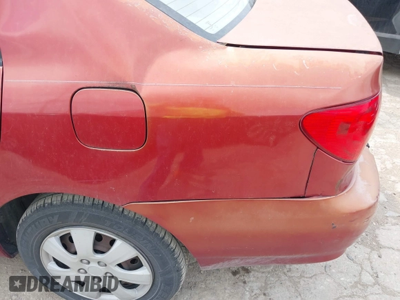 2004 Toyota Corolla CE with VIN 1NXBR32E14Z265397, listed as a IAAI auction lot 42182313 with 200,035 mi miles. Bid and sale history available at carsss.com. Image 6.